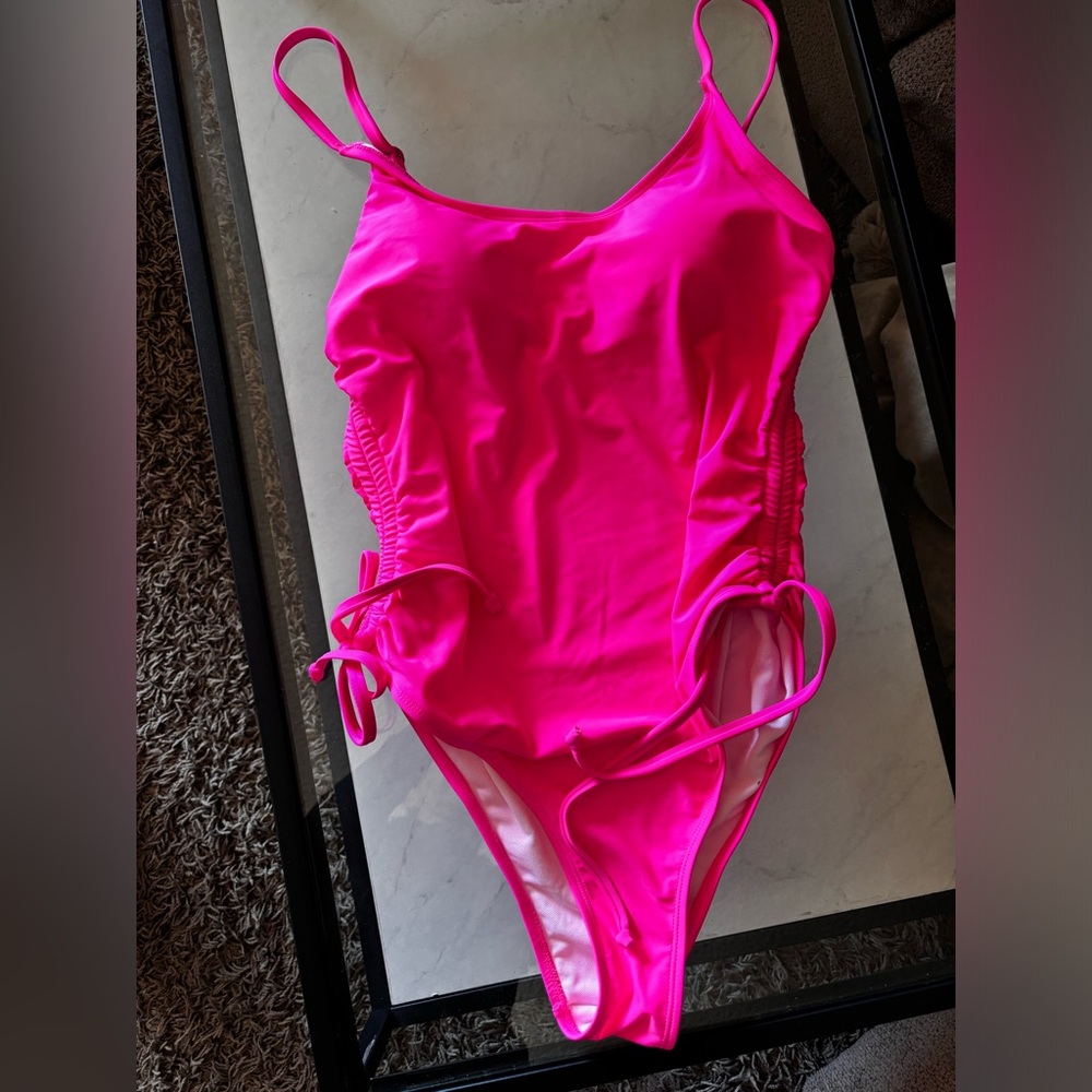 Never worn New Large bright pink women’s one piece swimsuit
